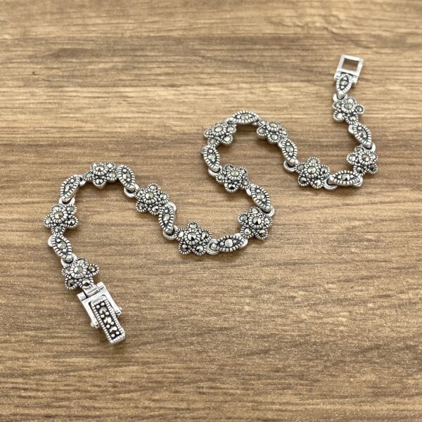 Silver marcasite flower bracelet clasp.