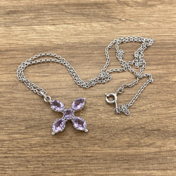 Amethyst cross pendant necklace.