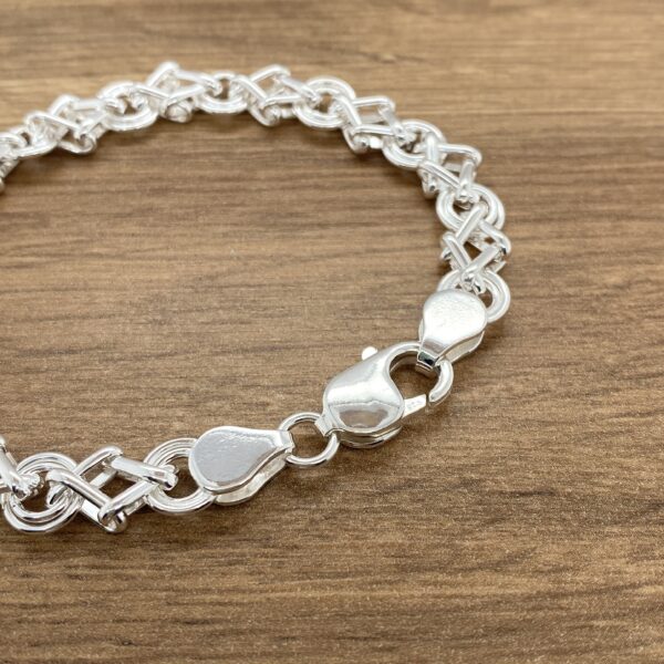 Silver link bracelet with clasp.