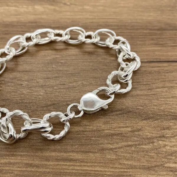 Silver twisted oval link bracelet.