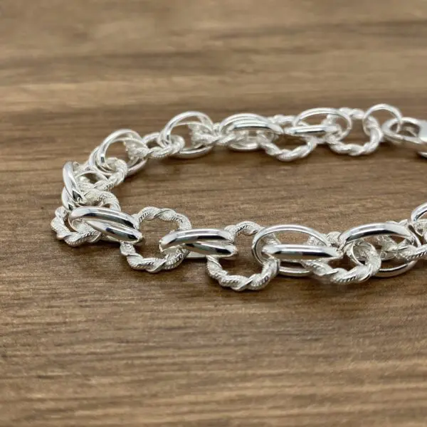 Silver twisted link chain bracelet.