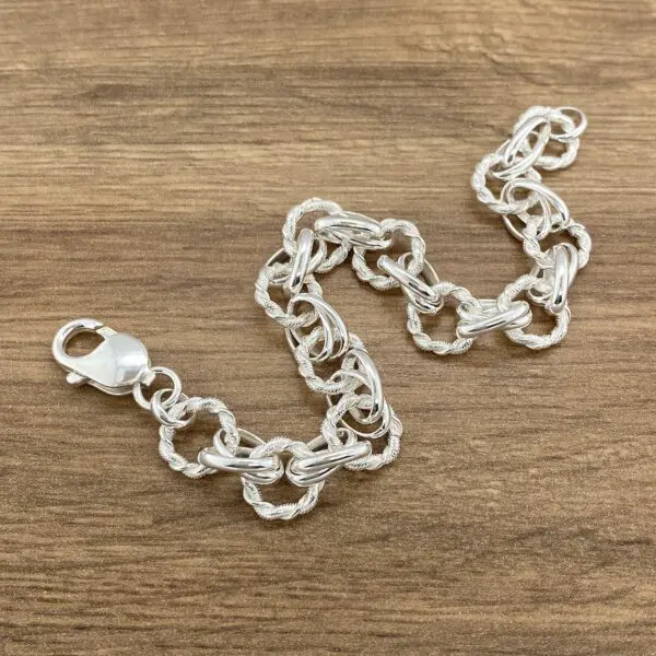 Silver chain link bracelet clasp.