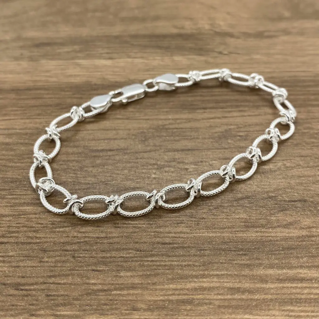 Silver oval link bracelet jewelry.