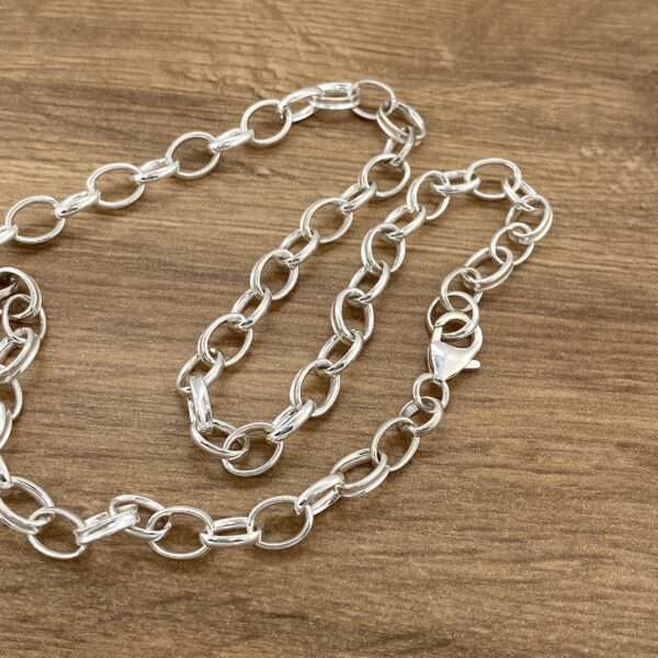 Silver oval link chain necklace.