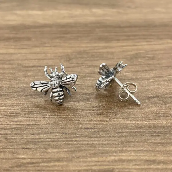 Sterling silver bee stud earrings.