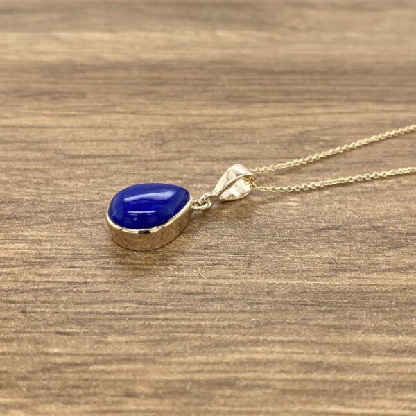 Teardrop lapis lazuli pendant necklace.